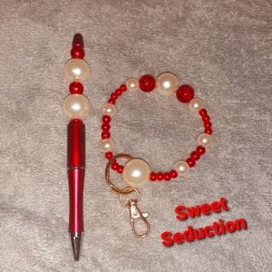 Keychain wristlet & ink pen